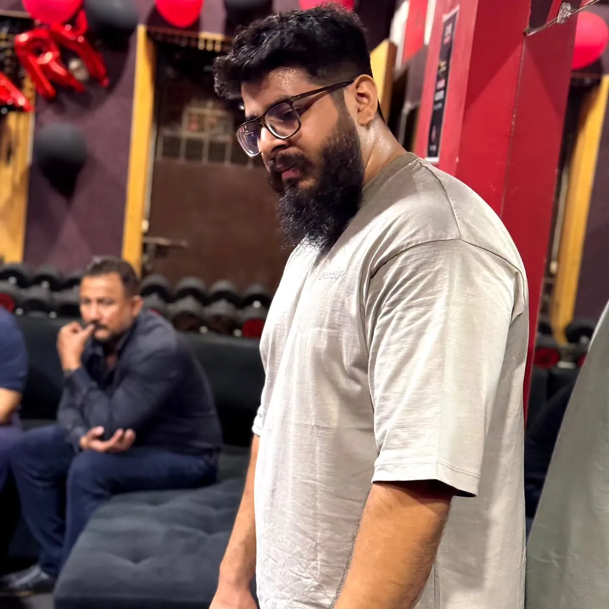 Muhammad Arsalan Nasir, founder of Optimum Fitness, on the gym floor